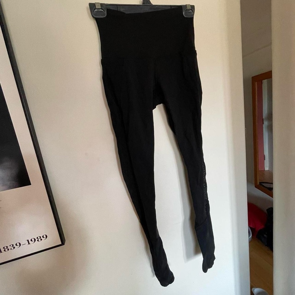 Lululemon black high waisted leggings with mesh cutouts